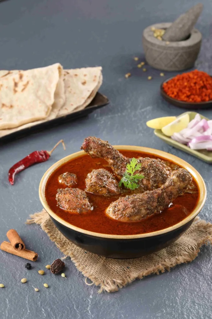 Solapuri Kala Chicken Rassa